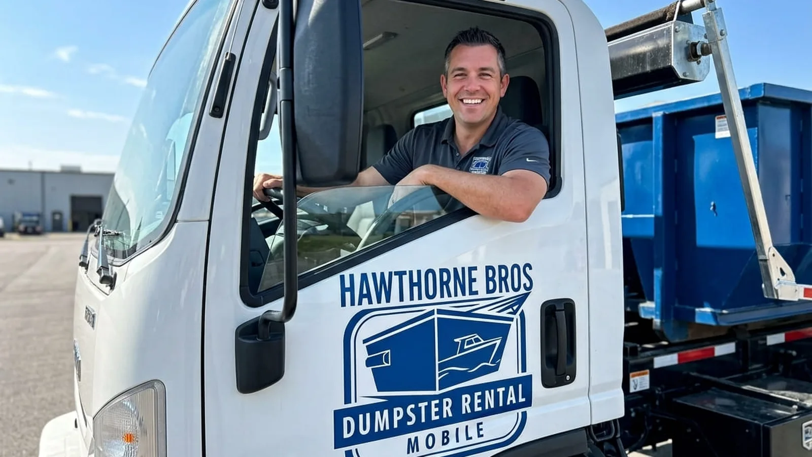 Dumpster rental in Mobile, AL Hawthorne Bros Dumpster Rental roll-off dumpster being delivered to a Mobile, Alabama driveway
